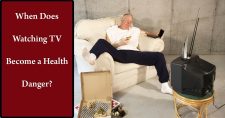 How Much Is Too Much When Watching TV? Picture of a middle aged caucasian male sitting on the couch in front of the TV eating pizza.